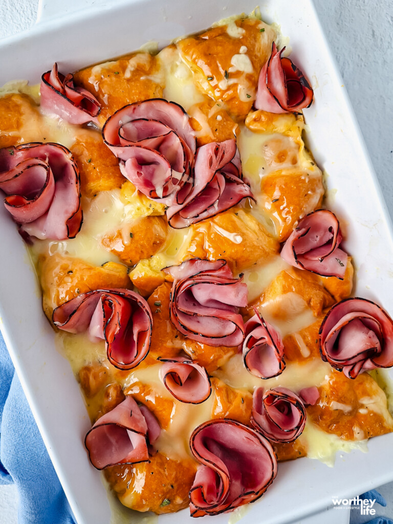 Ham & Cheese Croissant Bake Recipe in a white casserole dish