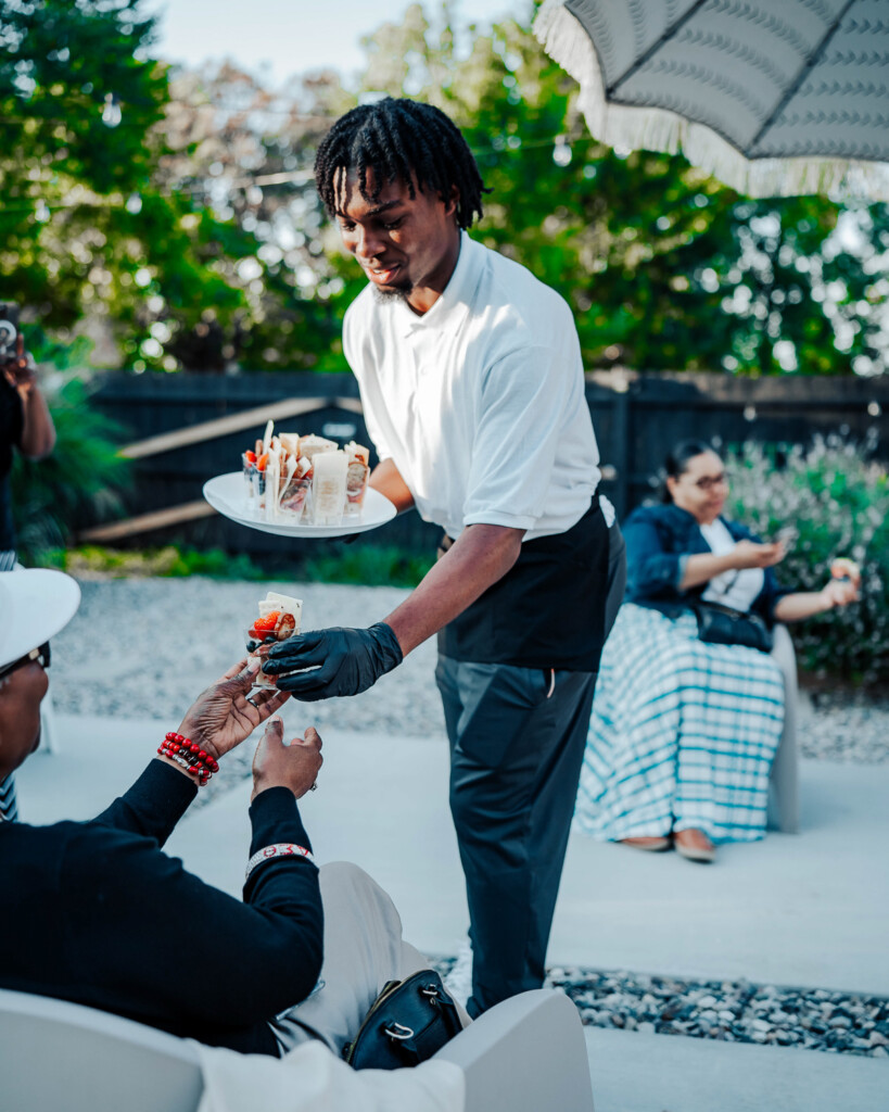 server handing someone food