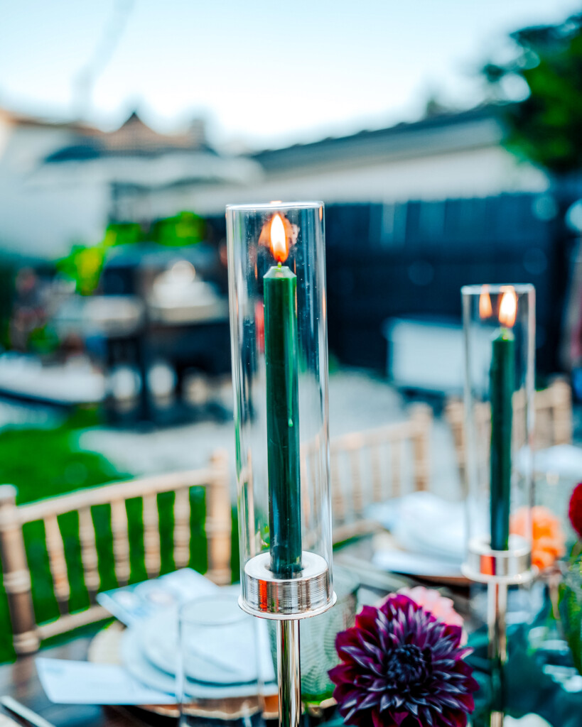 green candles in a candle holder