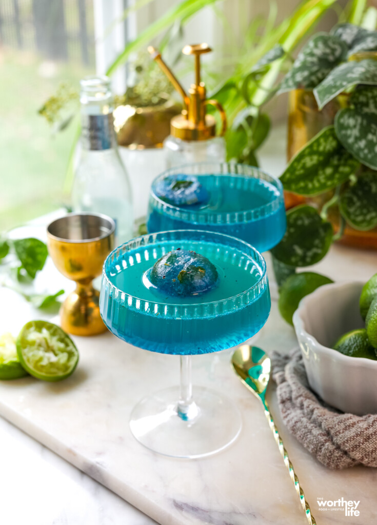 blue mocktail in a coupe glass
