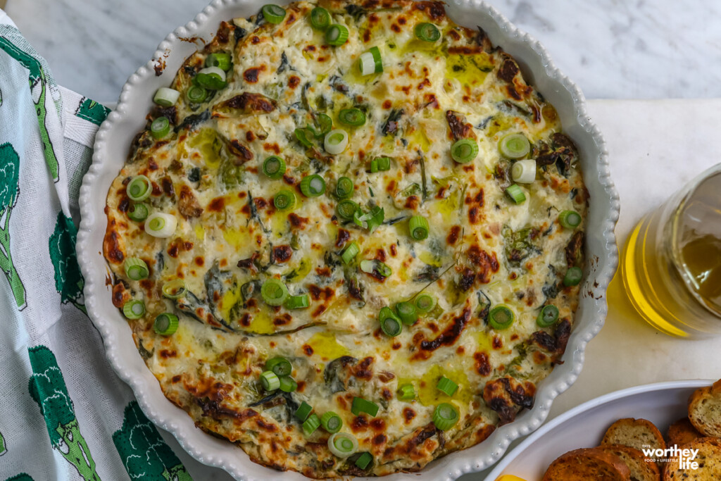 cheesy brussels sprouts dip on white background