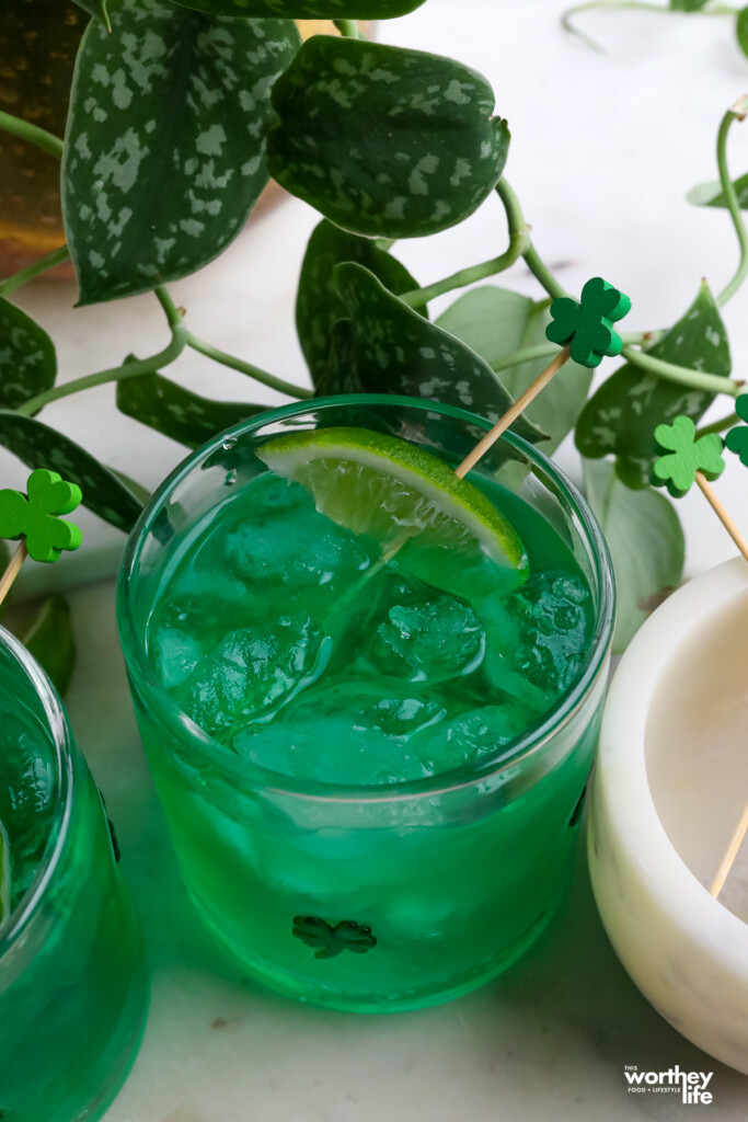 a Emerald Isle Punch Cocktail in a shamrock cocktail glass