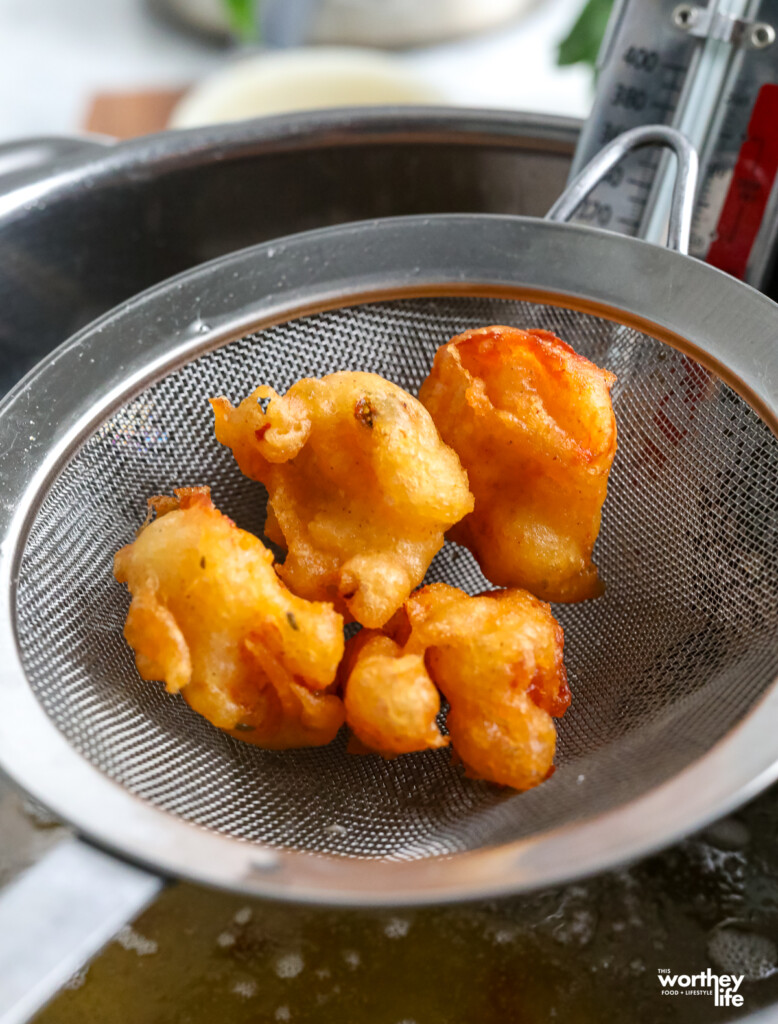 shrimp coming out of the hot fryer