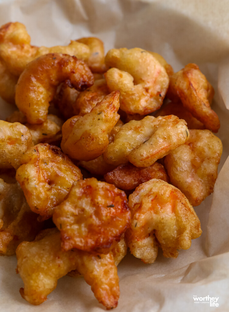 beer battered shrimp just fried in brown paper