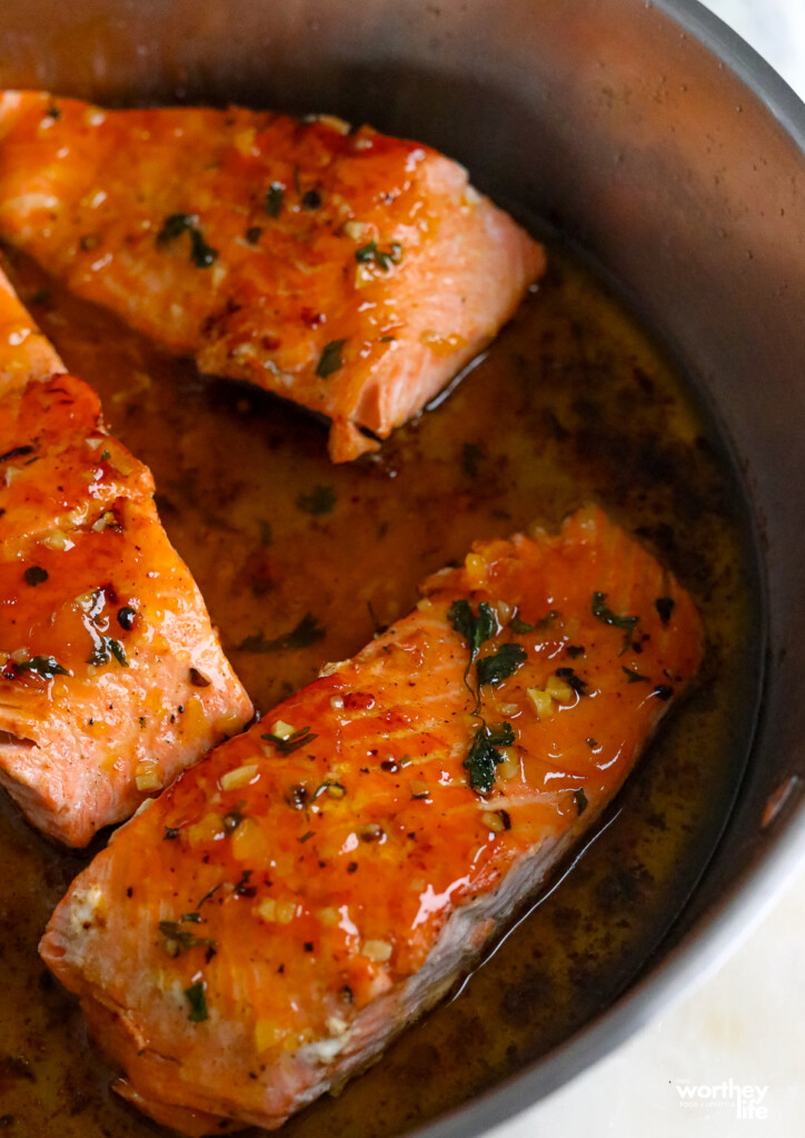 pan fried salmon in a saucepan