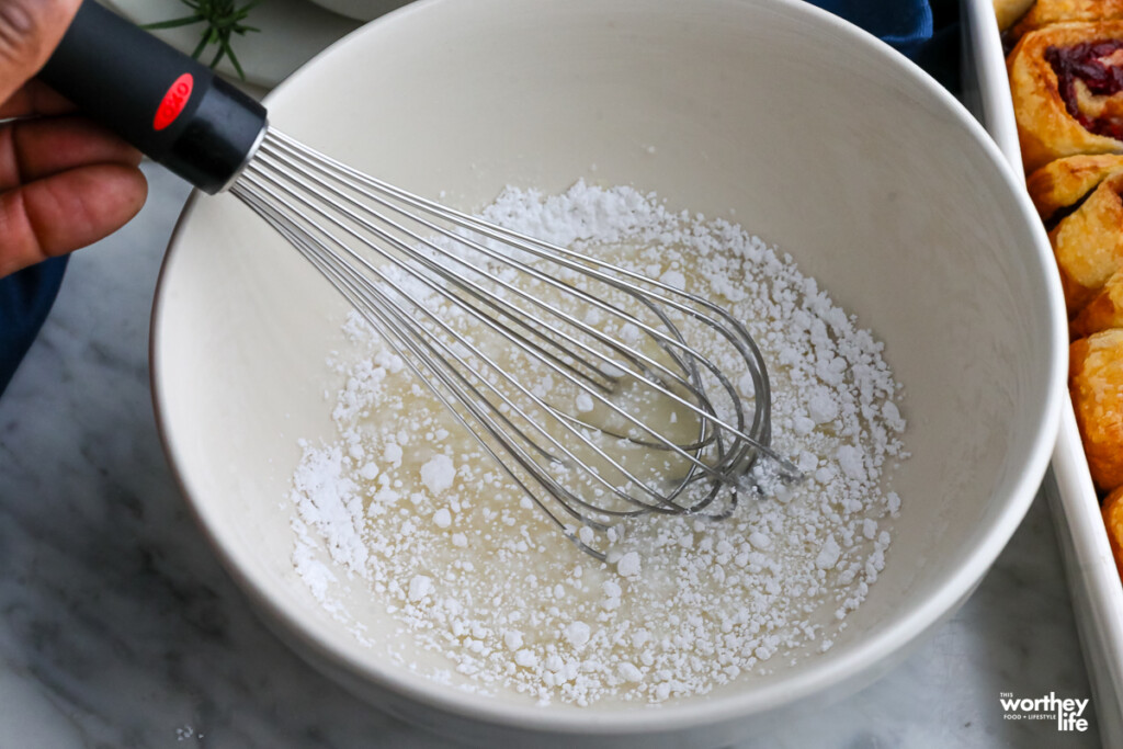 a whisk to make lemon icing