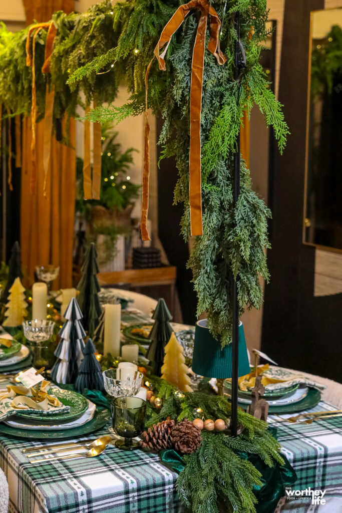 green and gold tablescape with greenery